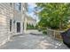 The outdoor deck is spacious and connects to the backyard, complemented by the home's neutral siding at 455 Firelite Ln, Suwanee, GA 30024