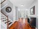 Spacious front entry foyer with hardwood floors and stairway at 455 Firelite Ln, Suwanee, GA 30024