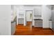 Open kitchen layout with modern cabinets and hardwood floors at 455 Firelite Ln, Suwanee, GA 30024
