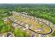 Scenic aerial perspective of the new home community surrounded by lush greenery and quiet streets at 6555 Hawkins Manor Dr, Cumming, GA 30040