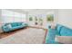 Relaxing living room with comfortable seating and a patio door that provides abundant natural light at 6555 Hawkins Manor Dr, Cumming, GA 30040