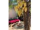 Beautiful outdoor area with a stone fountain, vibrant azaleas, and a view of the pool at 1145 Lake Shore Overlook, Alpharetta, GA 30005