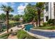 Stunning backyard oasis with pool, lake views, and mature landscaping. Perfect for entertaining at 1145 Lake Shore Overlook, Alpharetta, GA 30005