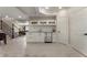 Basement wet bar featuring sleek white cabinetry and stainless steel appliances at 1145 Lake Shore Overlook, Alpharetta, GA 30005