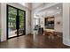 Bright foyer featuring hardwood floors and large glass front doors at 1145 Lake Shore Overlook, Alpharetta, GA 30005