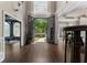 Grand foyer with high ceilings, hardwood floors, and large windows, offering an elegant and welcoming entrance at 1145 Lake Shore Overlook, Alpharetta, GA 30005