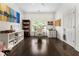 Bright home office with large window, built-in shelving and gleaming hardwood floors at 1145 Lake Shore Overlook, Alpharetta, GA 30005