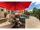 A luxurious backyard pool with waterfall feature, surrounded by mature landscaping and lounge chairs at 1145 Lake Shore Overlook, Alpharetta, GA 30005