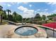 Beautiful backyard with pool, hot tub, and lake views make for relaxing entertainment at 1145 Lake Shore Overlook, Alpharetta, GA 30005