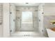 Modern shower with dual showerheads and a glass enclosure at 1145 Lake Shore Overlook, Alpharetta, GA 30005