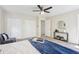 Spacious bedroom with large closets, a modern ceiling fan, and a lovely decor set at 218 Deerwood Se Ct, Smyrna, GA 30082