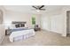Bedroom featuring a ceiling fan, closet space, and great natural light at 218 Deerwood Se Ct, Smyrna, GA 30082