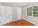 Cozy bedroom features hardwood floors, natural light and ample closet space at 2320 Crystal Ct, Loganville, GA 30052