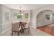 Cozy dining area with natural light, adjacent to the living room at 2320 Crystal Ct, Loganville, GA 30052