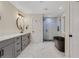 Ensuite bathroom with large soaking tub, glass enclosed shower and dual vanity at 235 Holly Nw Rd, Atlanta, GA 30314