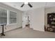 Bedroom with a window view and a open doorway to another room with a bookshelf at 235 Holly Nw Rd, Atlanta, GA 30314