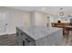 Close-up of the kitchen island, showcasing granite countertops and ample storage space for convenience at 235 Holly Nw Rd, Atlanta, GA 30314