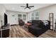 Inviting living area with a comfortable seating arrangement, modern floors, and lots of natural light at 235 Holly Nw Rd, Atlanta, GA 30314