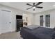 Spacious bedroom featuring french doors and view of ensuite bathroom at 235 Holly Nw Rd, Atlanta, GA 30314