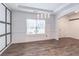 Formal dining room with modern chandelier, and custom wall design at 408 Blue Sky Cir, Acworth, GA 30102