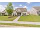 Charming single-Gathering home with a well-maintained lawn, sidewalk, and inviting curb appeal at 408 Blue Sky Cir, Acworth, GA 30102