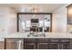 Beautiful kitchen island featuring stainless steel dishwasher, sink, and barstool seating at 408 Blue Sky Cir, Acworth, GA 30102