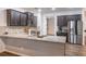 Modern kitchen featuring a granite countertop island, stainless steel appliances, and stylish cabinets at 408 Blue Sky Cir, Acworth, GA 30102