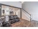 Open living room and kitchen area with stairs and modern finishes at 408 Blue Sky Cir, Acworth, GA 30102