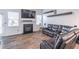 Comfortable living room with fireplace, large screen TV, and oversized couch at 408 Blue Sky Cir, Acworth, GA 30102
