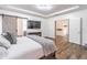 Inviting main bedroom with sliding barn door and ample space at 408 Blue Sky Cir, Acworth, GA 30102