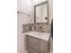 Stylish powder room featuring a modern vanity, vessel sink, and stone backsplash at 408 Blue Sky Cir, Acworth, GA 30102