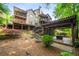 Stunning backyard featuring a multi-level deck, pergola, and lush landscaping at 4569 Fountain Ne Dr, Marietta, GA 30067