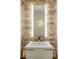 Bathroom with decorative vanity sink, mirror, and stone accent wall at 4569 Fountain Ne Dr, Marietta, GA 30067