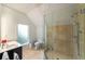 Bathroom featuring tile flooring, vanity, toilet, and a glass-enclosed shower at 4569 Fountain Ne Dr, Marietta, GA 30067