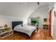 A bedroom with hardwood floors, track lighting, and a work desk in front of the window at 4569 Fountain Ne Dr, Marietta, GA 30067