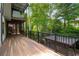 Multi-level deck overlooking a lush backyard with an outdoor seating area at 4569 Fountain Ne Dr, Marietta, GA 30067