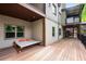Outdoor deck with a daybed, natural light, and space for relaxation at 4569 Fountain Ne Dr, Marietta, GA 30067