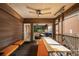 Enclosed porch with a dining table, a ceiling fan, and ample space for gatherings at 4569 Fountain Ne Dr, Marietta, GA 30067