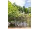 Balcony view overlooking lush greenery, offering privacy and a serene outdoor space at 1100 Parker Ne Pl, Atlanta, GA 30324