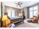 Cozy bedroom with a four-poster bed, lamps, and a serene atmosphere at 1100 Parker Ne Pl, Atlanta, GA 30324