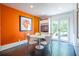 Cozy breakfast nook with modern chairs, a round table, and view to the backyard through french doors at 1100 Parker Ne Pl, Atlanta, GA 30324