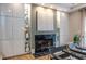 Modern fireplace surrounded by custom shelving with glass displays at 1100 Parker Ne Pl, Atlanta, GA 30324