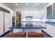The spacious kitchen features a large island with seating, modern appliances, and ample lighting at 1100 Parker Ne Pl, Atlanta, GA 30324