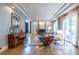 Spacious living area boasting a fireplace, large windows, and hardwood floors at 1100 Parker Ne Pl, Atlanta, GA 30324