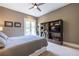 Neutral toned main bedroom featuring balcony access and large built in shelving at 1100 Parker Ne Pl, Atlanta, GA 30324