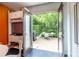 View of the outdoor patio, accessible through the glass doors, offering a perfect blend of indoor-outdoor living at 1100 Parker Ne Pl, Atlanta, GA 30324