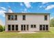 Exterior rear of home featuring a spacious backyard and classic siding at 1931 Abinger Way, Lawrenceville, GA 30043