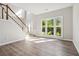 Spacious foyer filled with natural light and hardwood floors at 1931 Abinger Way, Lawrenceville, GA 30043