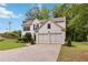 Beautiful two-story home with a spacious driveway and a well-manicured lawn at 1931 Abinger Way, Lawrenceville, GA 30043