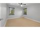 Bright bedroom featuring large windows and wood-look floors providing a cozy and relaxing atmosphere at 2917 Reveille Se Cir, Atlanta, GA 30316